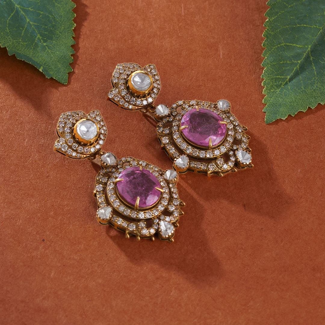 Rose Polki — A pink centre stone ringed in white, hung from a single uncut top.